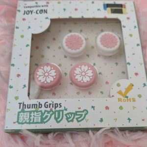 Thumb grips for controller